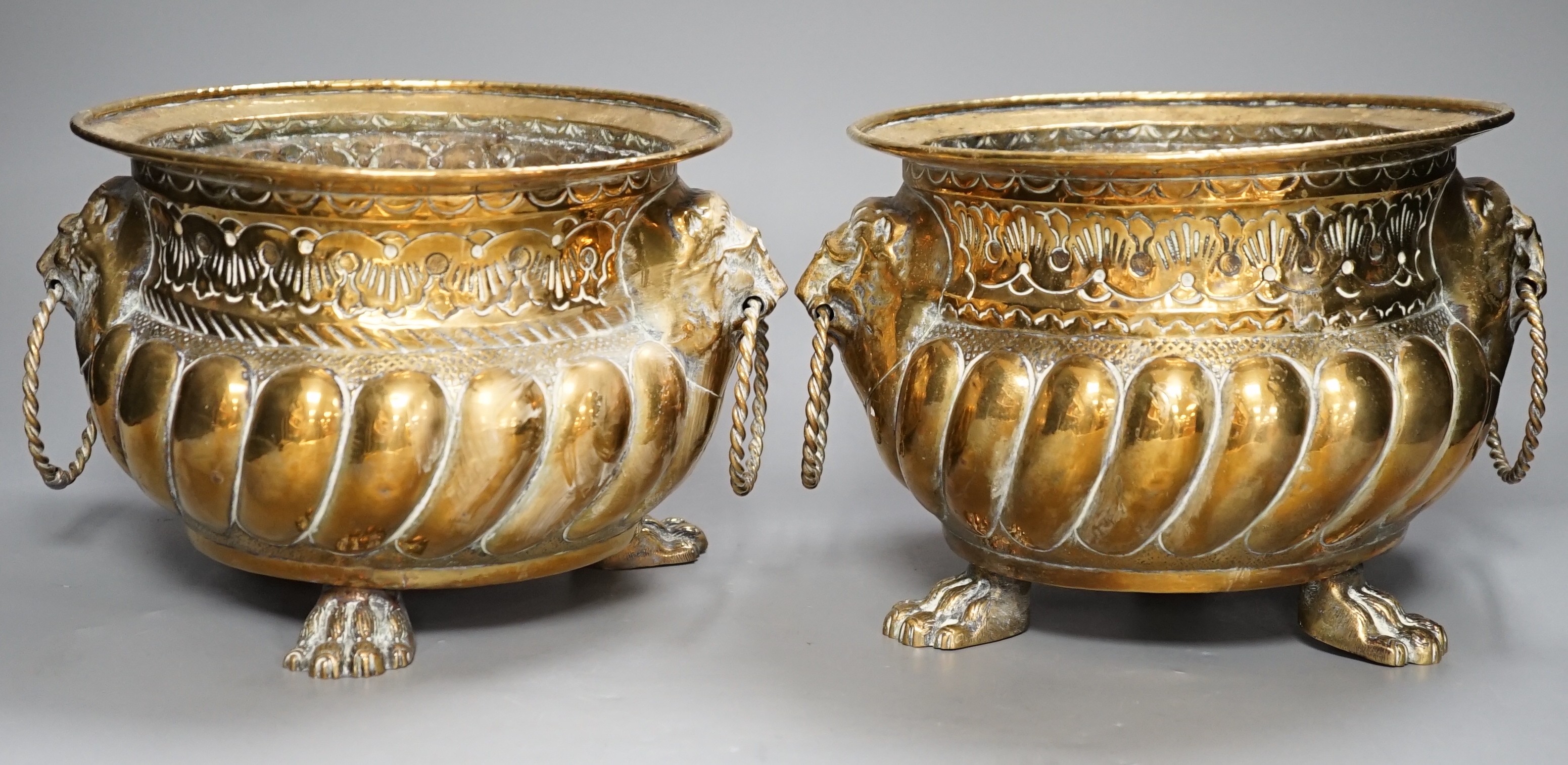 A pair of 19th century Dutch brass two handled jardinieres, 25cm handle to handle